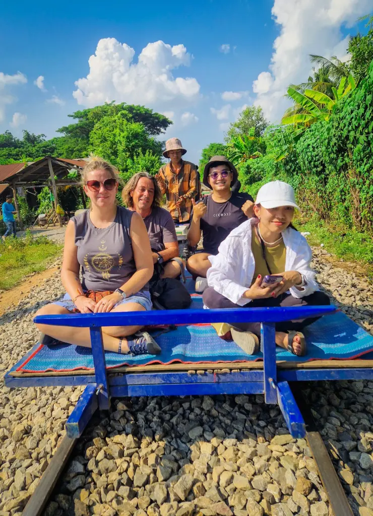 Em on the bamboo train in Battambang