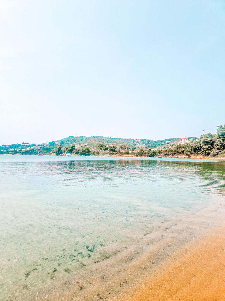 sand and clear water at Panormos beach