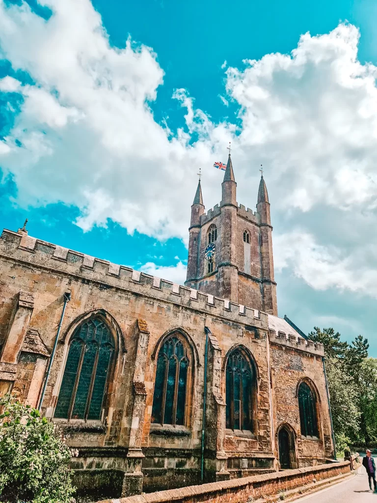 Large medieval church with tower seen from the side