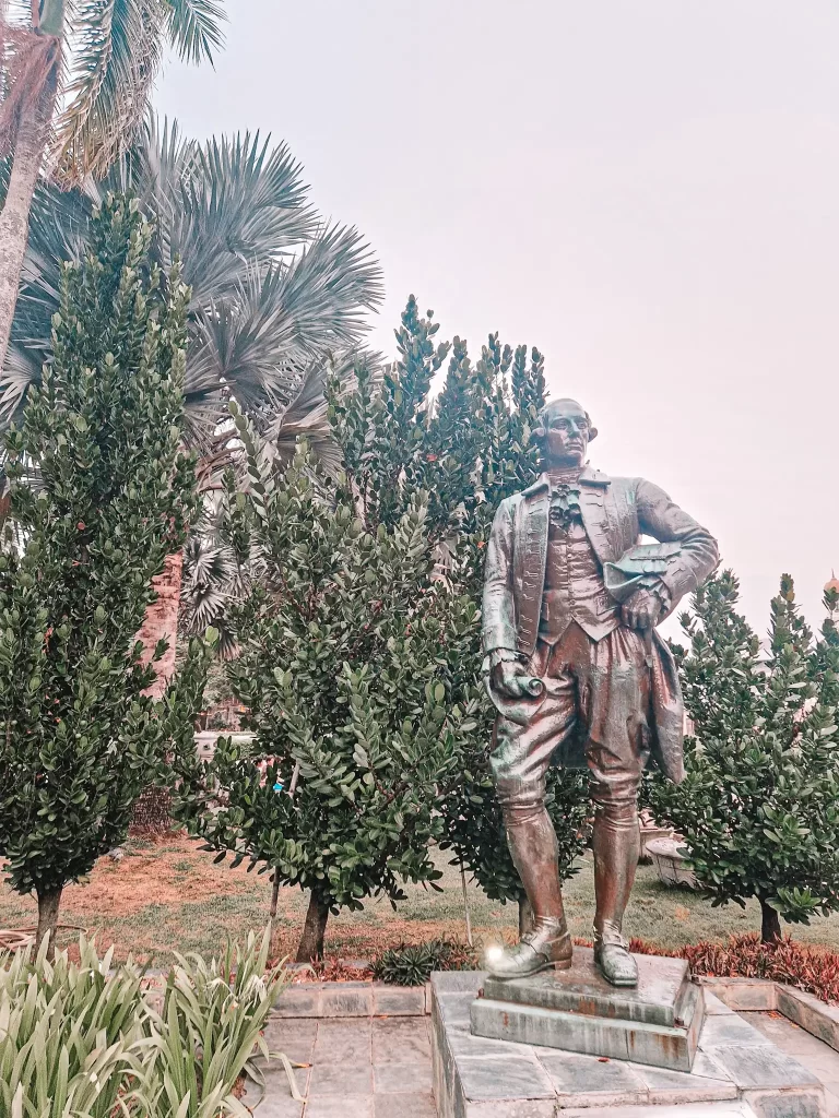 Statue of old fashioned man in a park