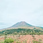 Volcano in Sumatra with fields in front