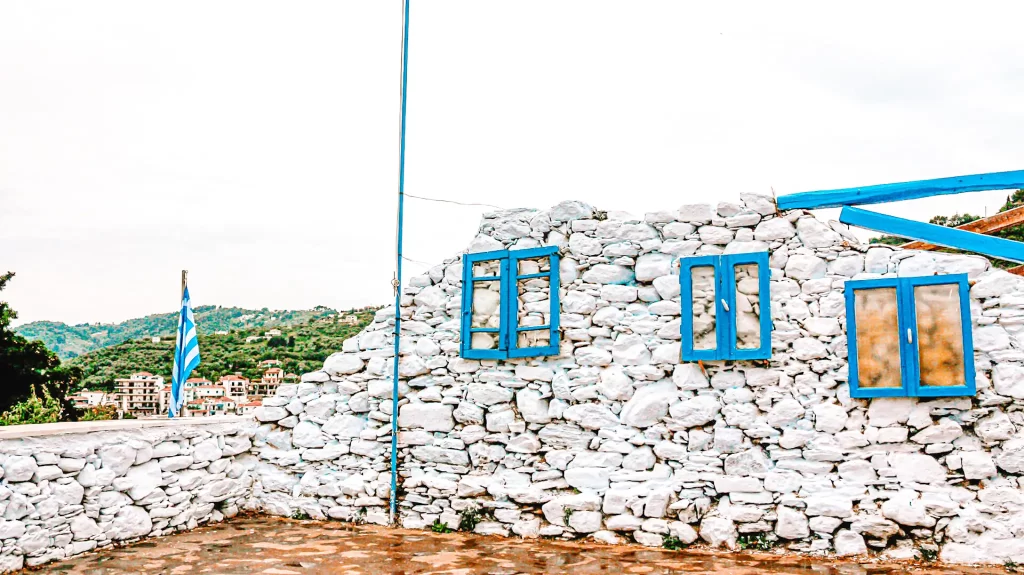 white wall with blue windows