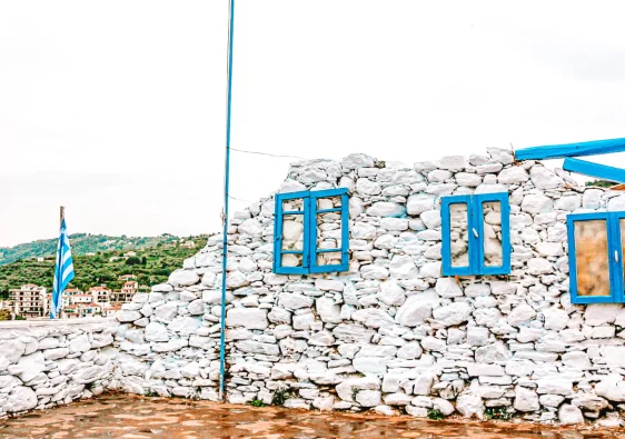 white wall with blue windows