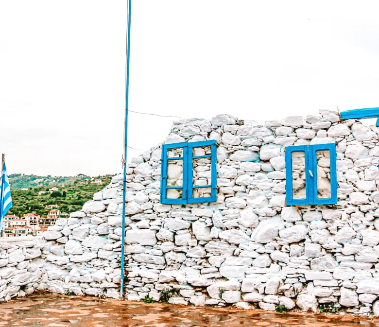 white wall with blue windows