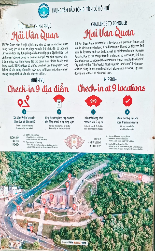 Informational sign explaining the “Challenge to Conquer Hai Van Quan,” with English and Vietnamese text, outlining a mission to check in at 9 historical locations using an NFC-enabled phone, accompanied by a satellite image map with marked points.