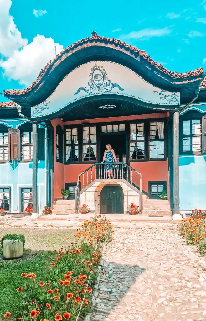 Em standing outside the ornate Lutova House in Koprivshtitsa, a fine example of Bulgarian National Revival architecture.