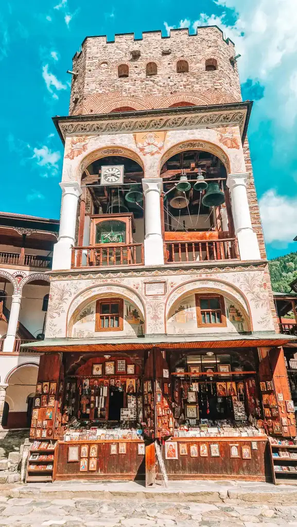The ornate clock and bell tower at Rila Monastery, decorated with frescoes and icons, often included on longer Plovdiv day trips.